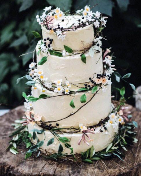 Four Tiered Cake With August Wedding Flowers