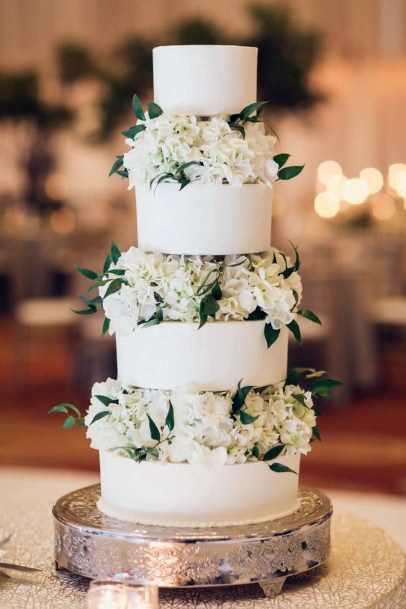 Four Tiered Cake With Hydrangea Wedding Flowers