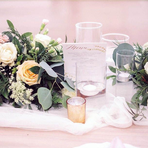 Frosted Glass And Wedding Flower Centerpieces