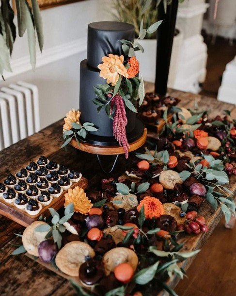 Fruity Orange On Black Wedding Cake