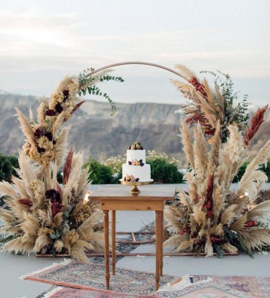 Fun Bohemian Inspired Dried Wheat And Grasses Climbing Wedding Arch Ideas