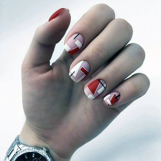 Geometrical Design On Bright Red Nails For Women