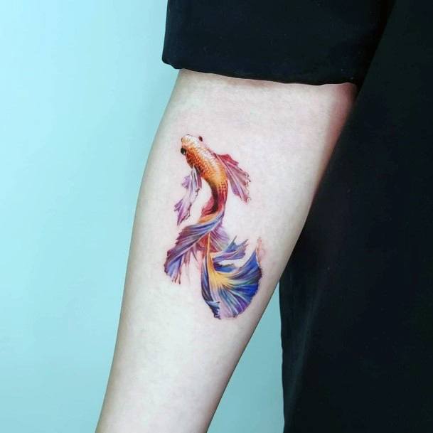 Georgeous Betta Fish Tattoo On Girl