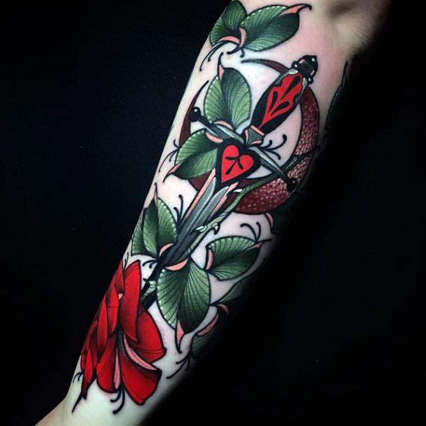 Georgeous Dagger Rose Tattoo On Girl