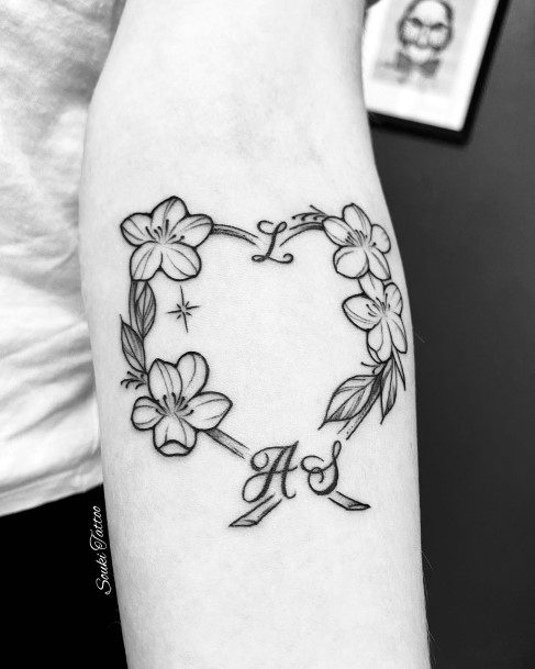 Georgeous Flower Heart Tattoo On Girl