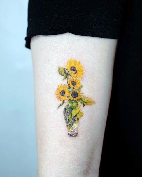 Georgeous Flower Vase Tattoo On Girl