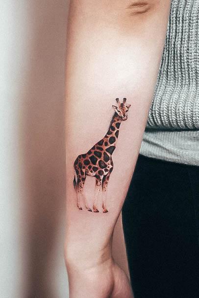Georgeous Giraffe Tattoo On Girl Outer Forearm