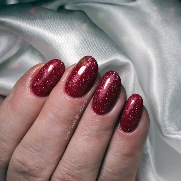 Georgeous Maroon Glitter Nail On Girl