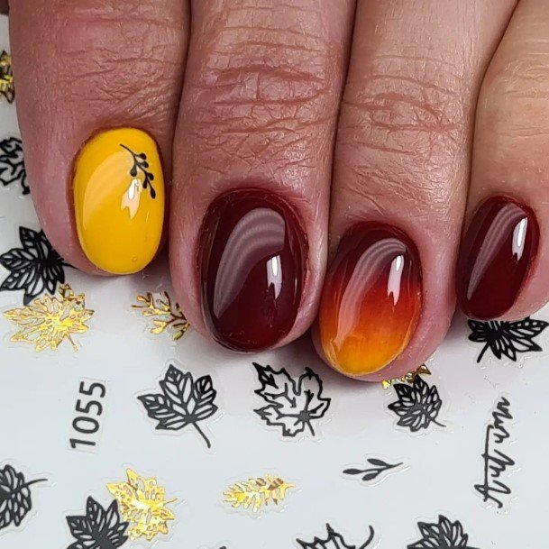 Georgeous Red And Yellow Nail On Girl