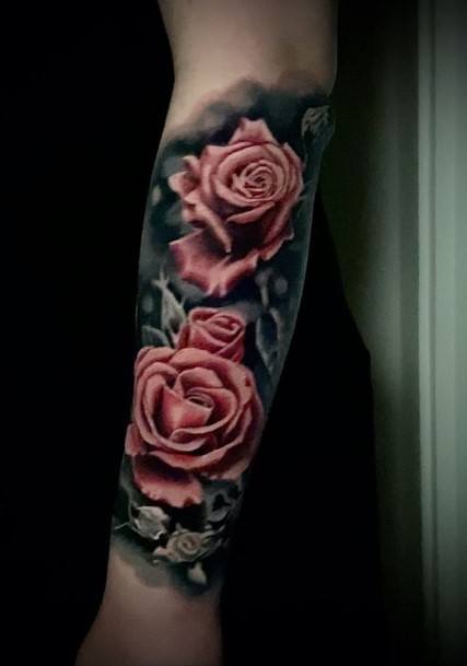 Georgeous Rose Forearm Tattoo On Girl