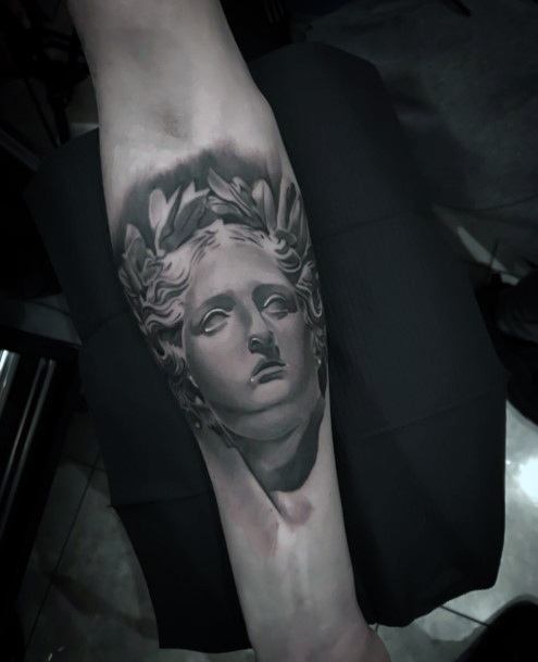 Georgeous Statue Tattoo On Girl