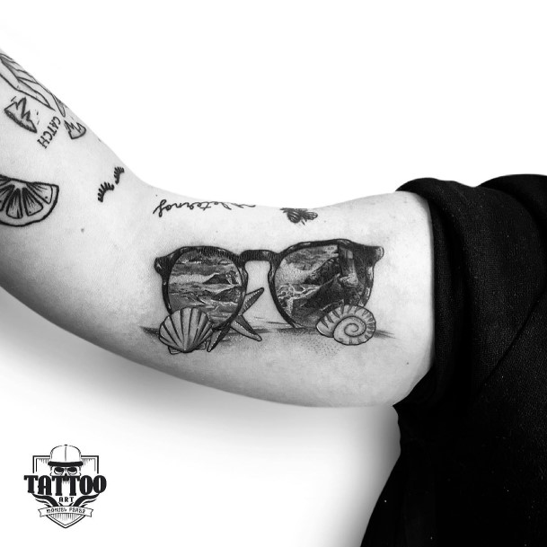 Georgeous Sunglasses Tattoo On Girl