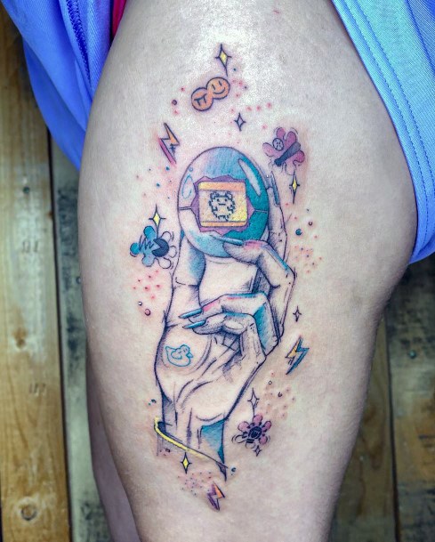 Georgeous Tamagotchi Tattoo On Girl