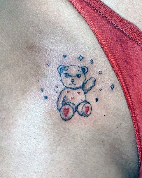 Georgeous Teddy Bear Tattoo On Girl
