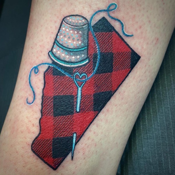 Georgeous Thimble Tattoo On Girl