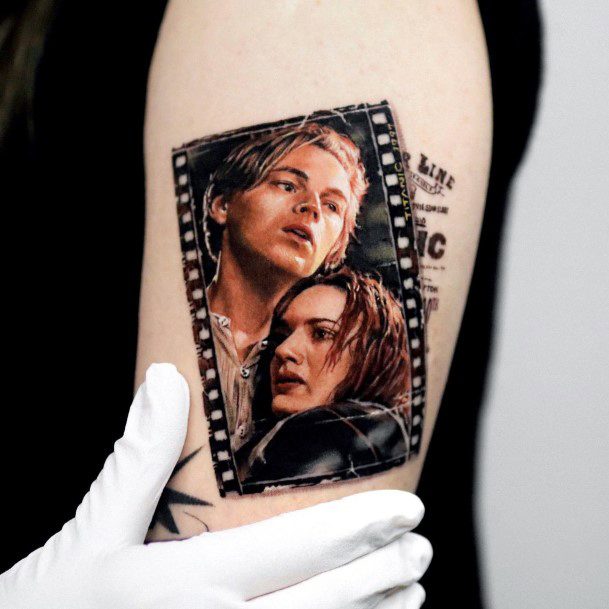 Georgeous Titanic Tattoo On Girl