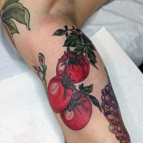 Georgeous Tomato Tattoo On Girl