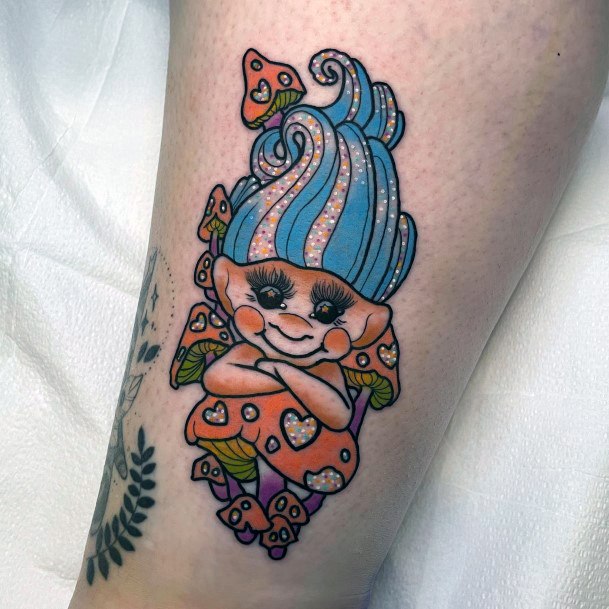 Georgeous Troll Doll Tattoo On Girl