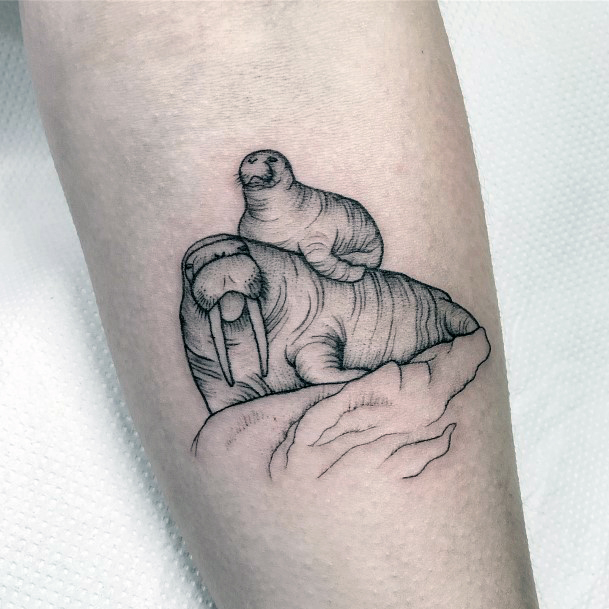 Georgeous Walrus Tattoo On Girl