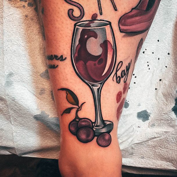 Georgeous Wine Tattoo On Girl