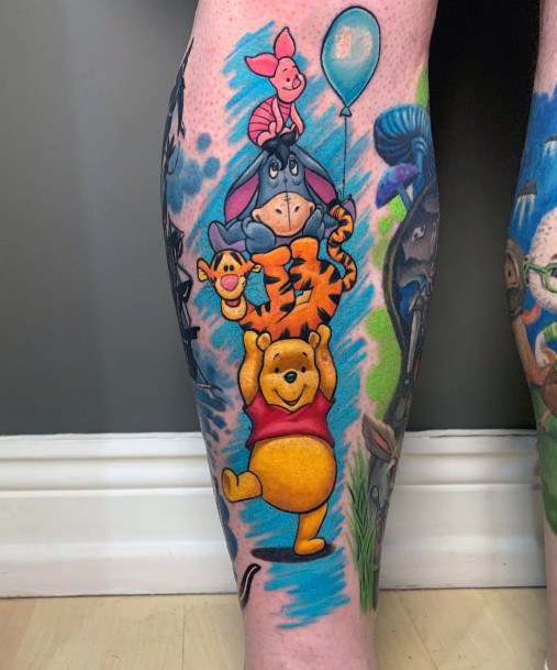 Georgeous Winnie The Pooh Tattoo On Girl