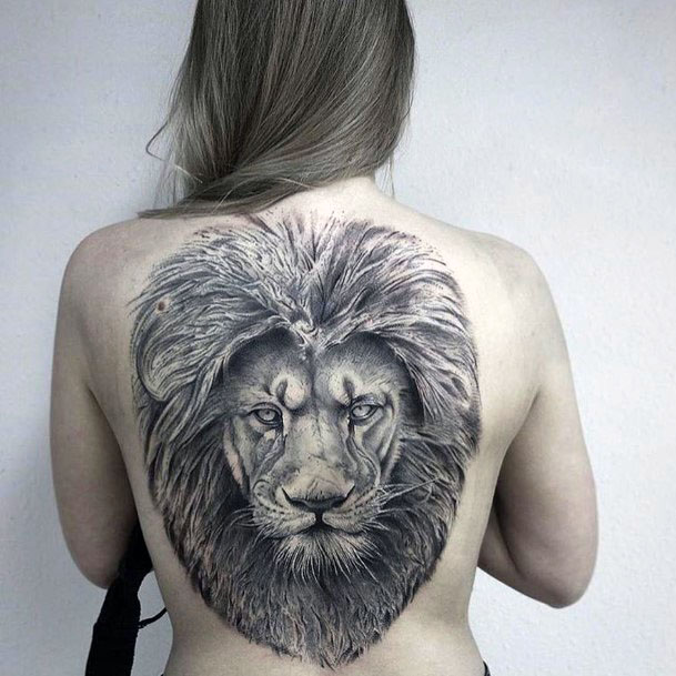 Gigantic Fierce Lion Tattoo On Womens Back