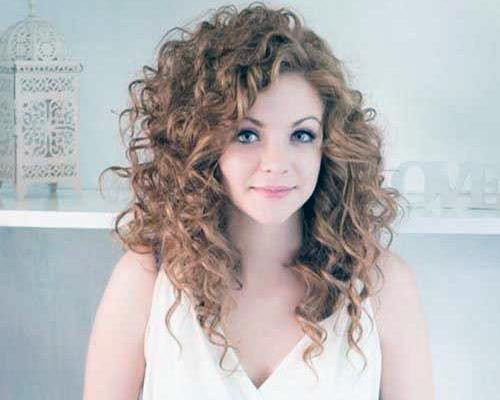 Ginger Natural Summer Hairstyle On Woman With Long Relaxed Curls