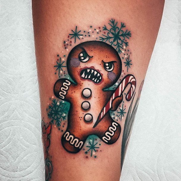 Girl With Angry Gingerbread Man Tattoo Design