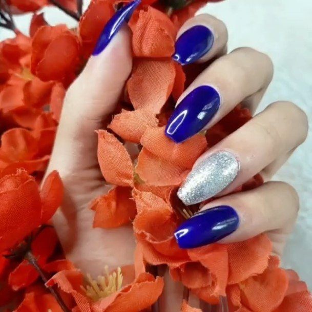 Girl With Darling Blue And Silver Nail Design