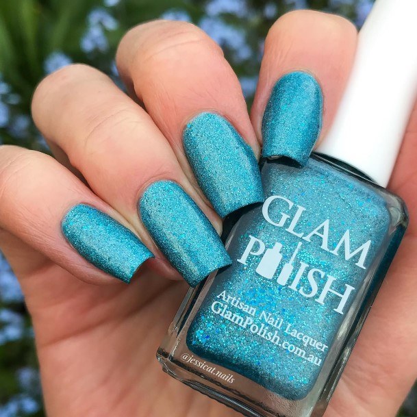 Girl With Darling Blue Glitter Nail Design