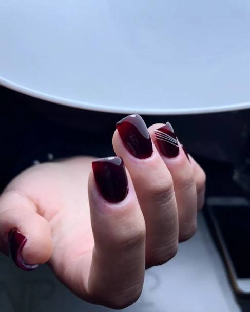 Girl With Darling Burgundy Nail Design