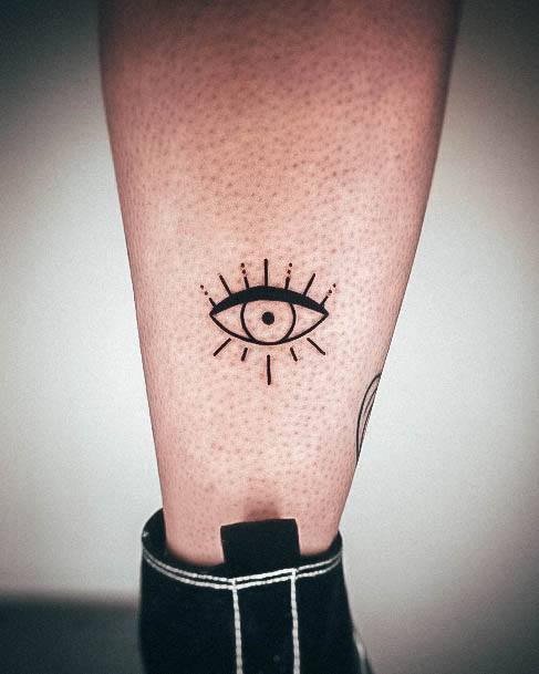 Girl With Darling Evil Eye Tattoo Design