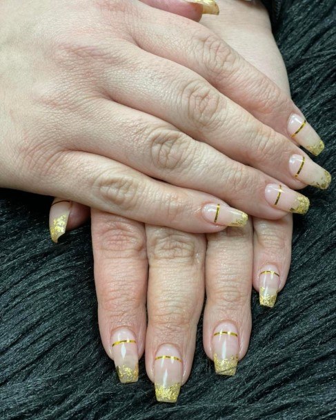 Girl With Darling Gold French Tip Nail Design