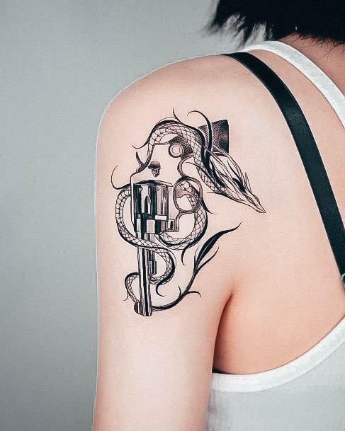 Girl With Darling Gun Tattoo Design