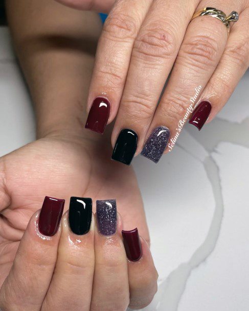 Girl With Darling Maroon And Black Nail Design