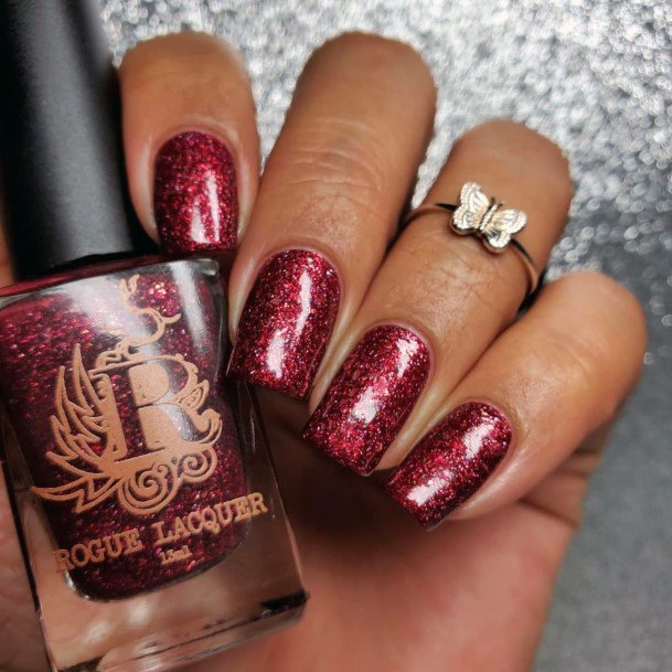 Girl With Darling Maroon Glitter Nail Design