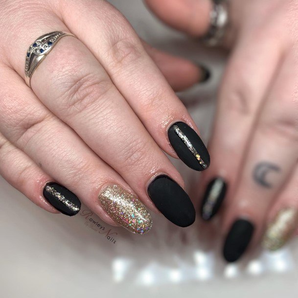 Girl With Darling Matte Black And Gold Nail Design