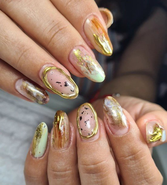 Girl With Darling Metallic Gold Nail Design