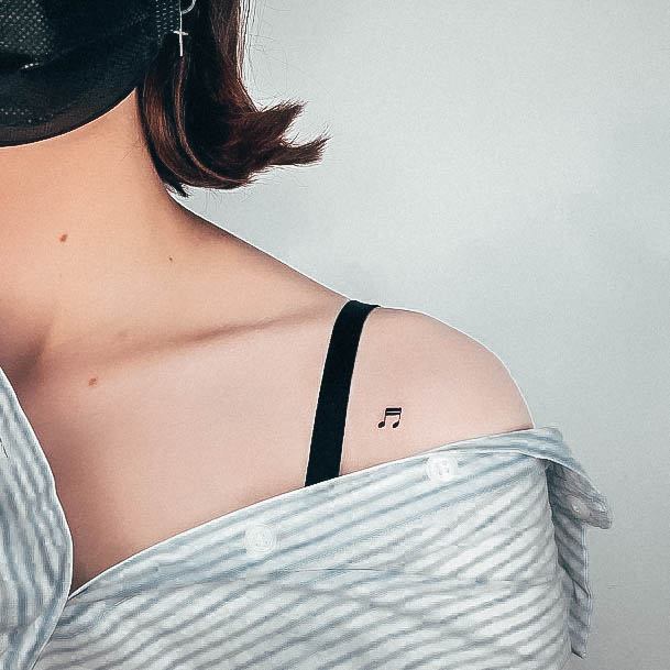 Girl With Darling Music Note Tattoo Design