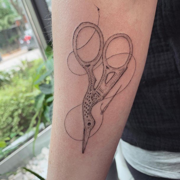 Girl With Darling Needle And Thread Tattoo Design