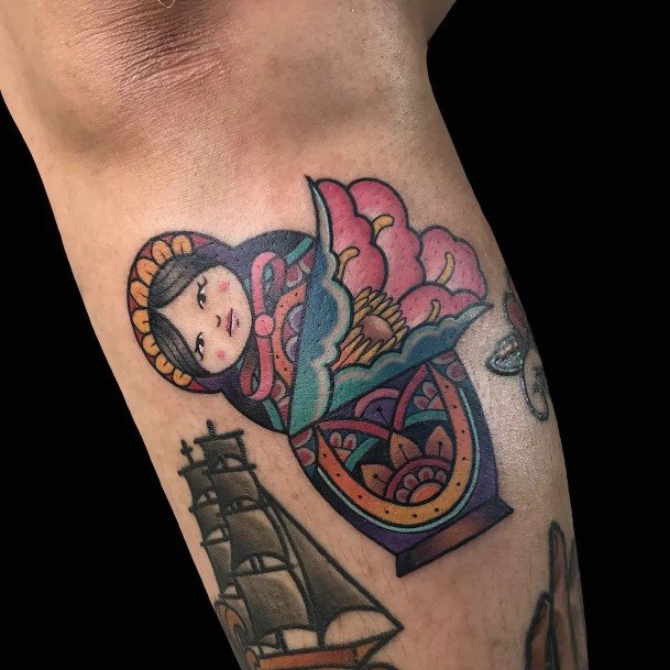 Girl With Darling Russian Nesting Doll Matryoshka Tattoo Design