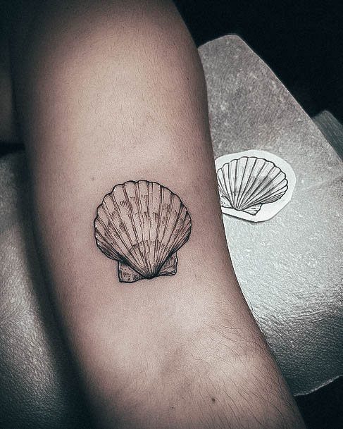 Girl With Darling Seashell Tattoo Design