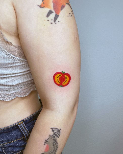 Girl With Darling Tomato Tattoo Design