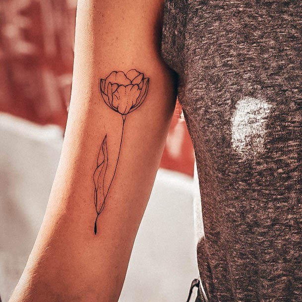 Girl With Darling Tulip Tattoo Design