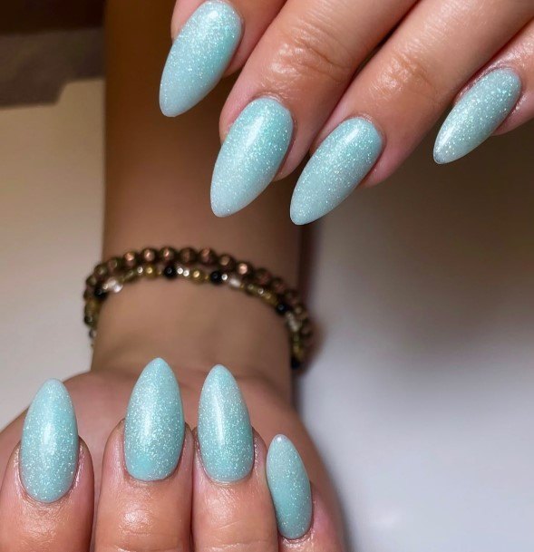 Girl With Darling Turquoise Nail Design