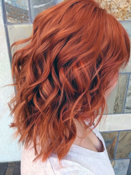 Girl With Easy Red Orange Wavy Shoulder Length Hair