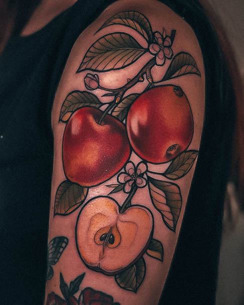 Girl With Feminine Apple Tattoo