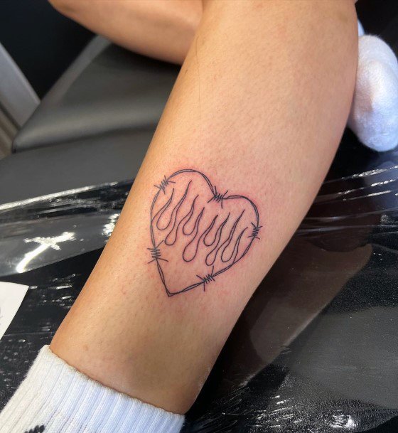 Girl With Feminine Barbed Wire Tattoo