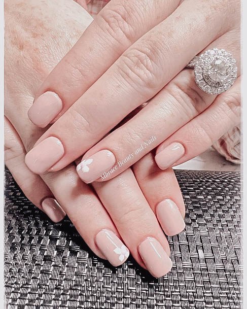 Girl With Feminine Beige Nail