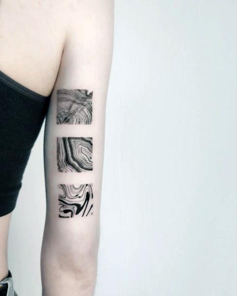 Girl With Feminine Bicep Tattoo